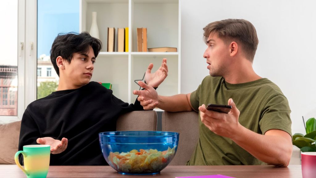 Two men arguing at the table