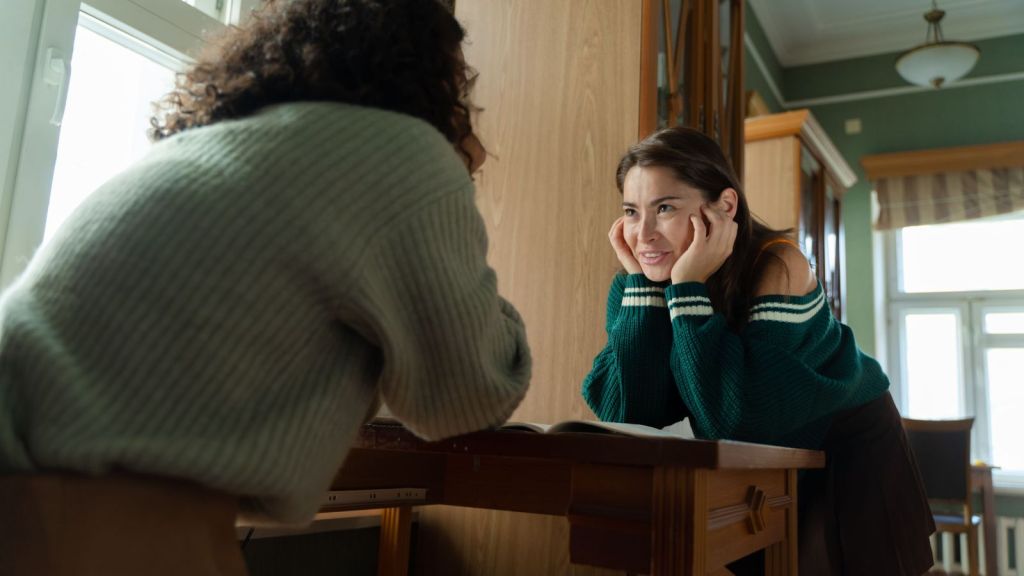 Two women in college talking