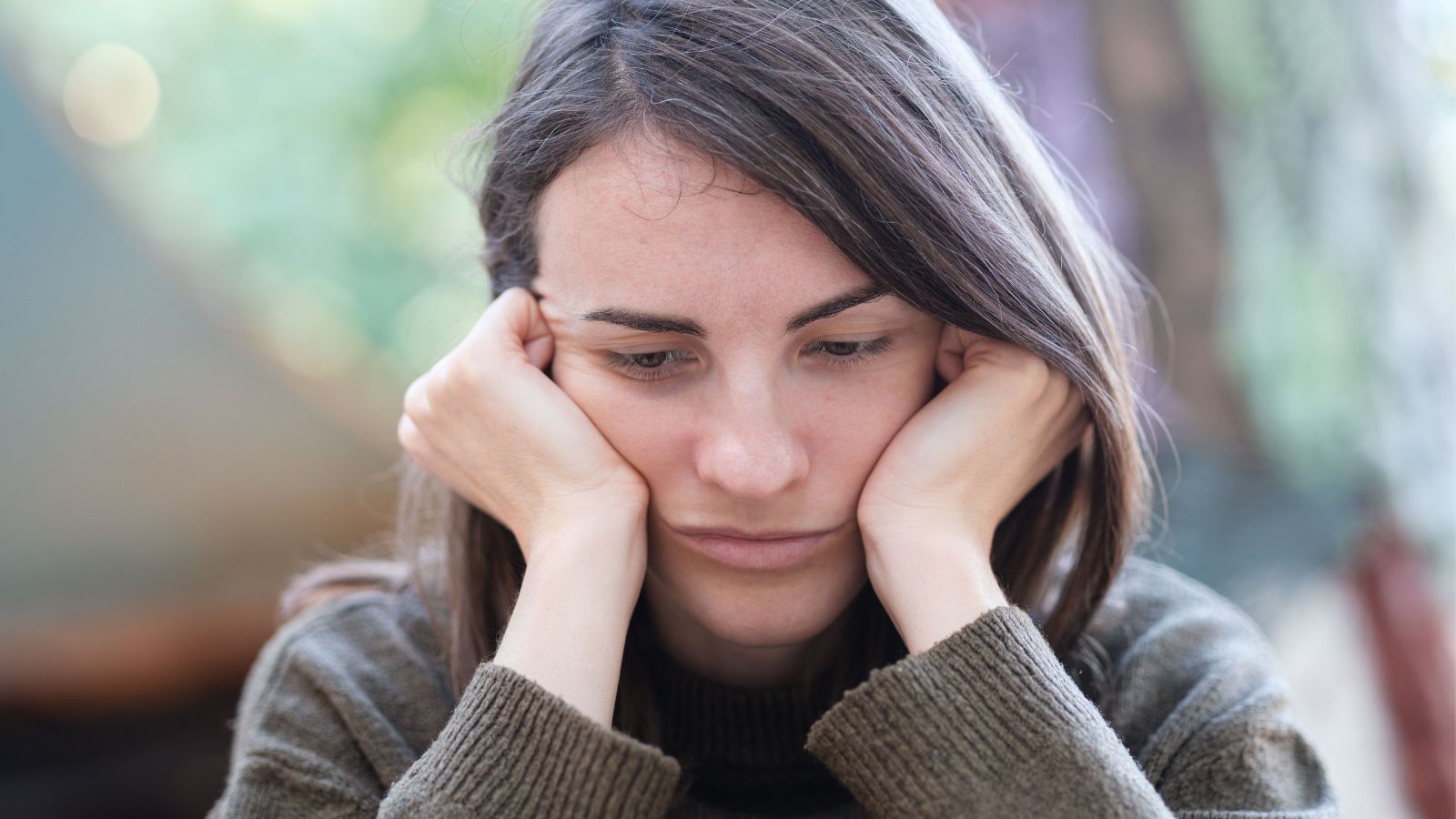 Cruel Remarks From Her Sister in Law Ruined Her Excitement—and Now She’s Having Second Thoughts About the Wedding sad woman in grey sweater