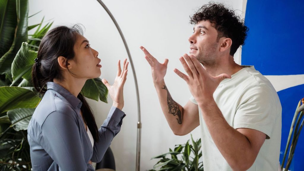 Man and woman arguing in their house