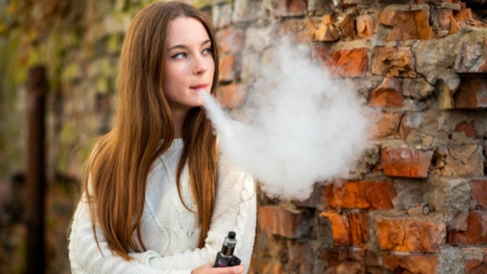 Teen girl vaping