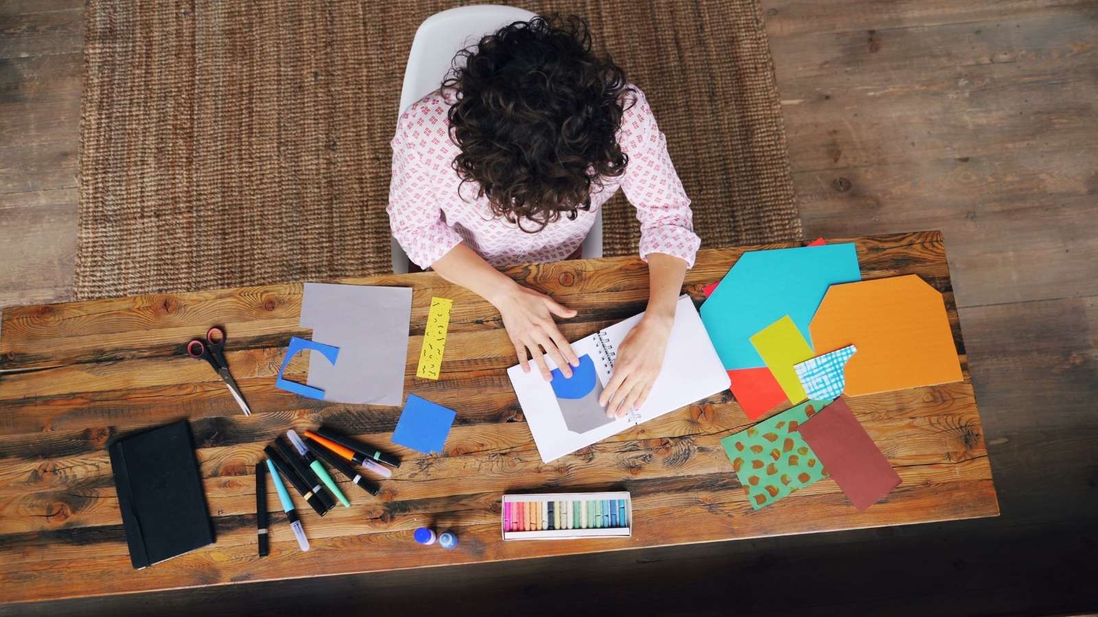 Friendship Frustration: Woman Stops Making Plans After Being Ditched Twice aerial view of woman crafting