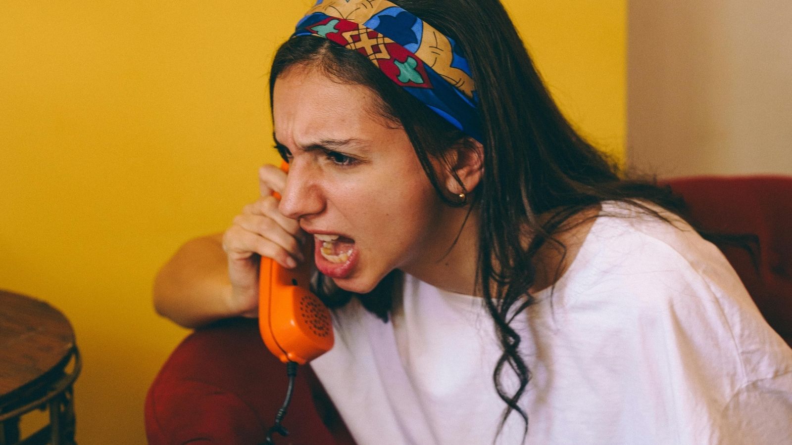 Manager Refuses $10 Pizza Refund, Leading to Violent Confrontation With Customer woman on the phone