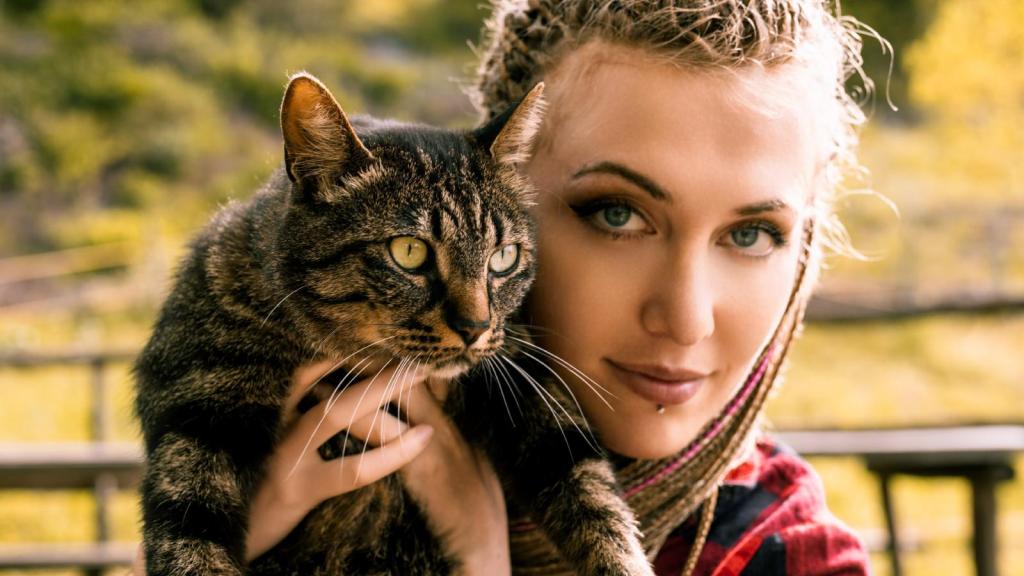 woman holding a cat