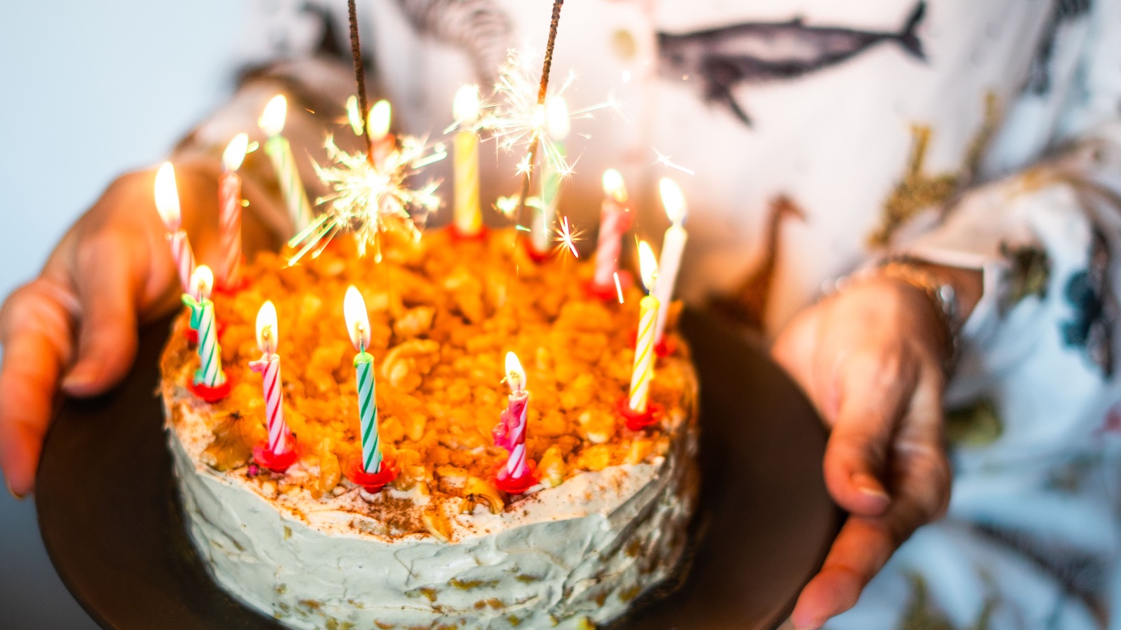 birthday cake with lit candles