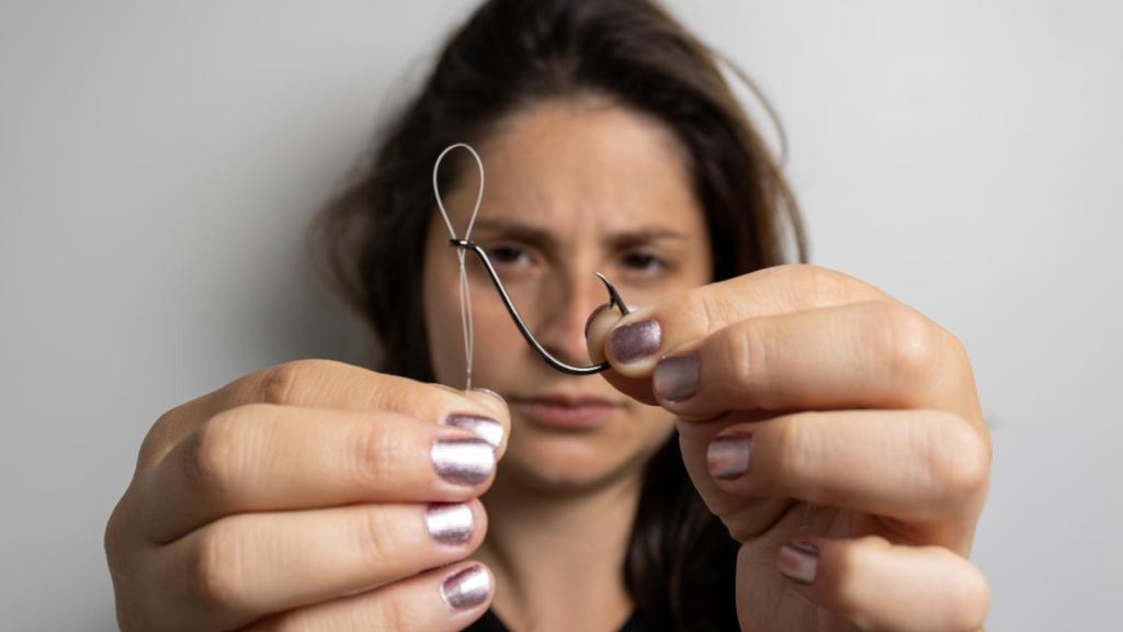 woman with a fish hook