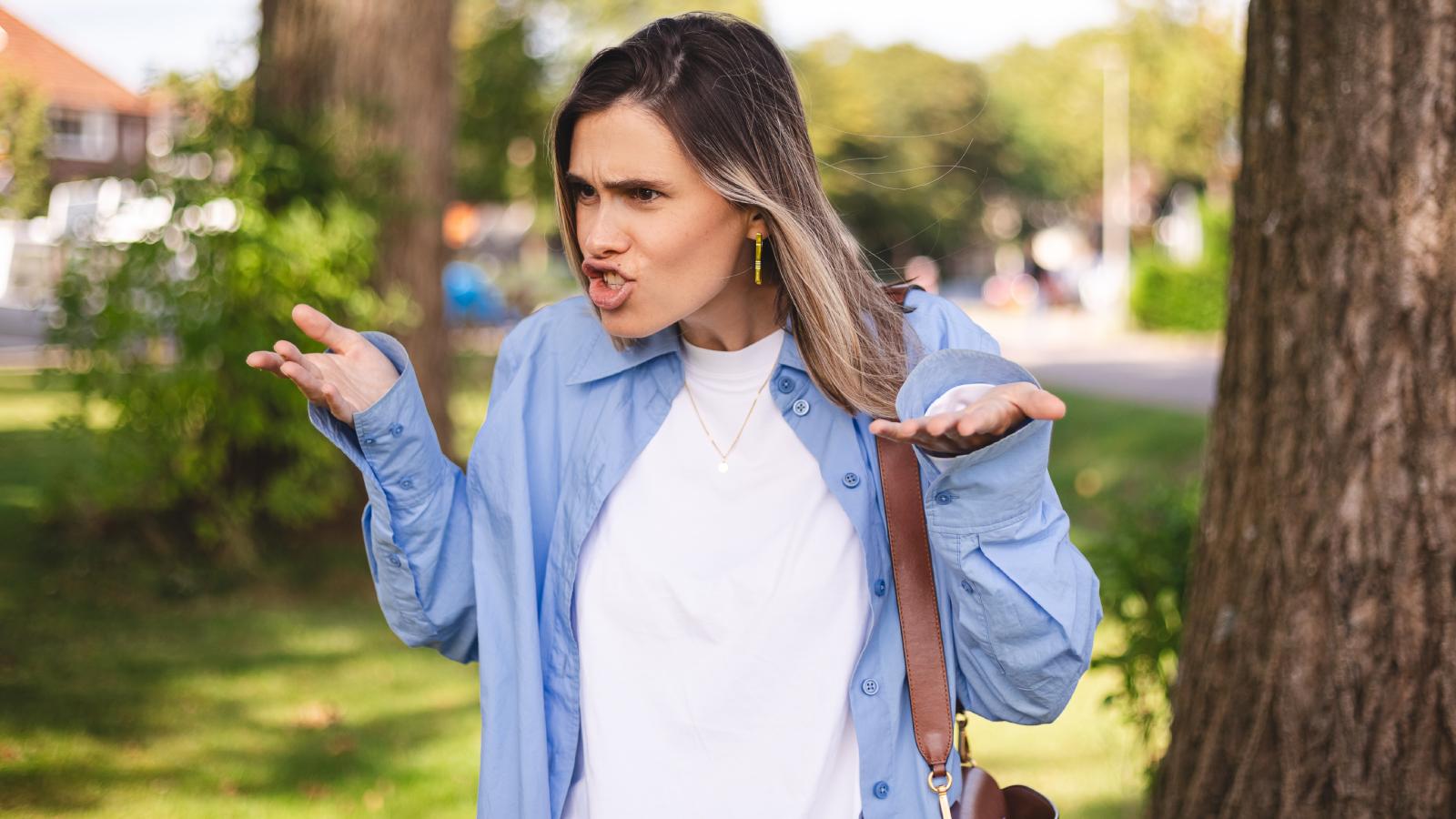 They Asked Their Neighbor’s Guests Not to Park in Their Spot, But The Neighbor Responded by Screaming on Their Front Lawn woman yelling in a street