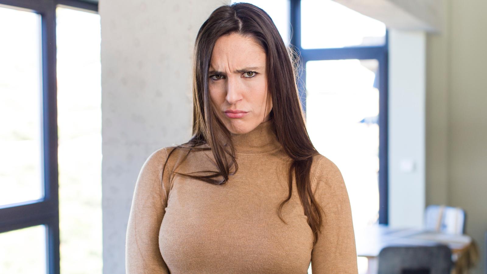 I Dont Feel Safe Here: Tenant Horrified to Learn Maintenance Can Enter Her Home Without Warning woman with a serious look