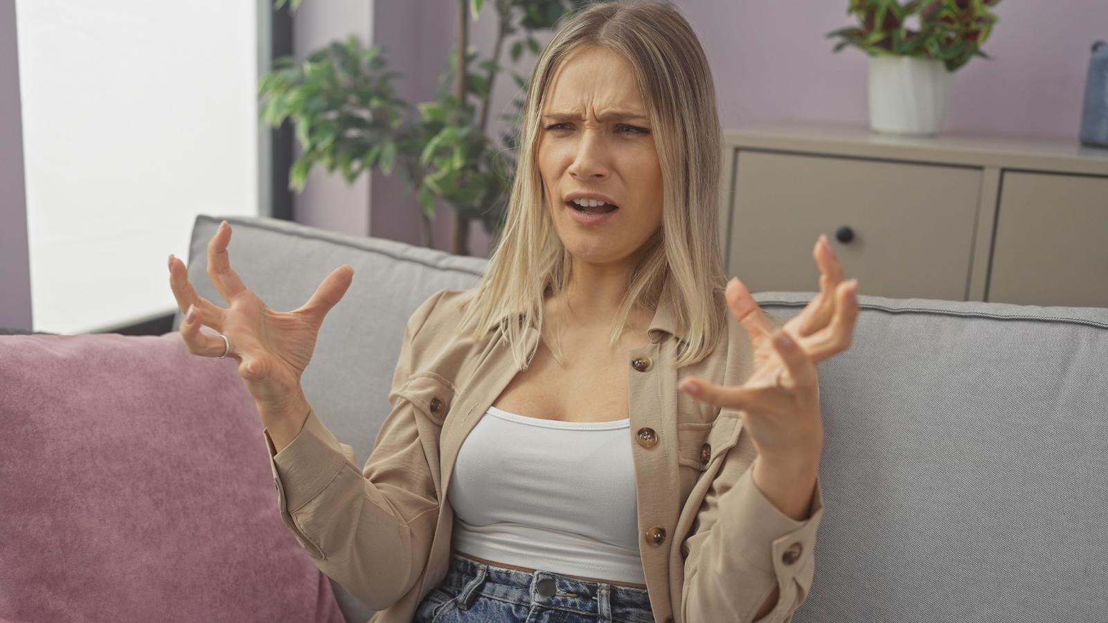Neighbor Talks So Loudly They Can Be Heard Through Closed Windows—And It’s Driving Everyone Crazy woman on a couch
