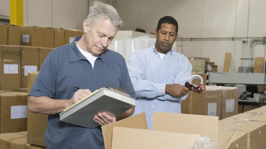 two men in a warehouse