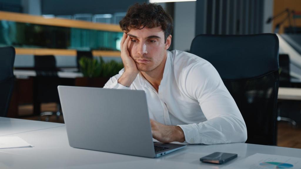 man bored at his desk