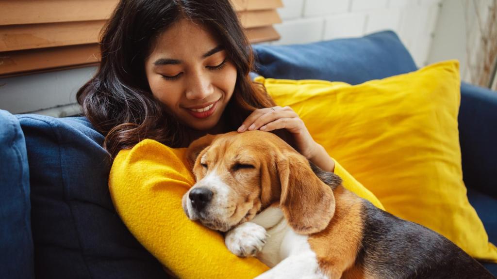 woman holding a dog