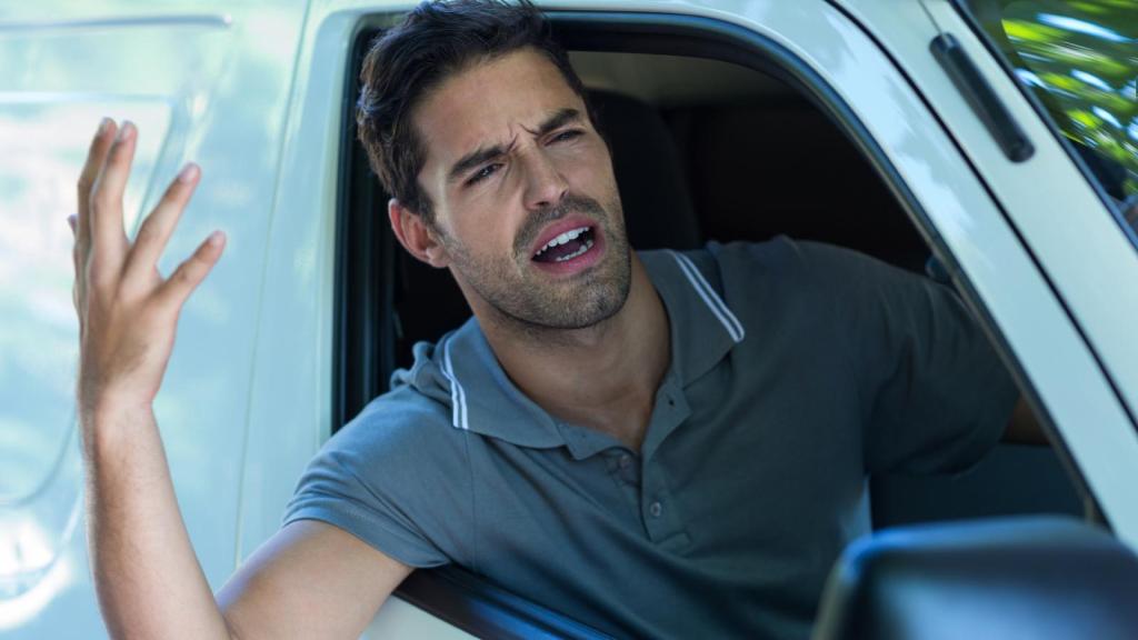 man in a car
