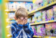 Her Son Refused to Put Away His Tablet at Checkout, So She Used a Classic Parenting Trick to Get Him Moving