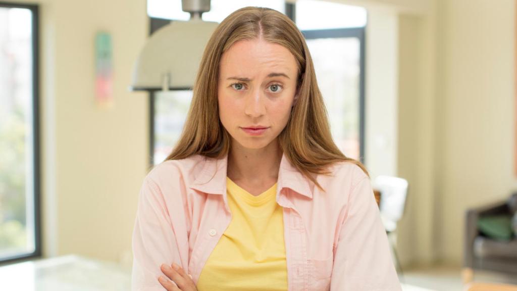 woman with her arms crossed