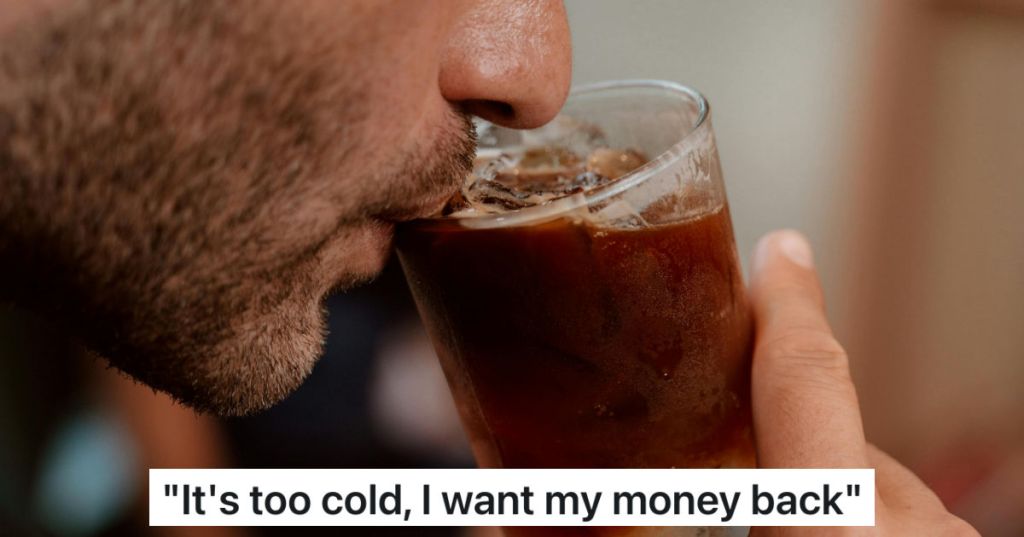 man sipping iced coffee