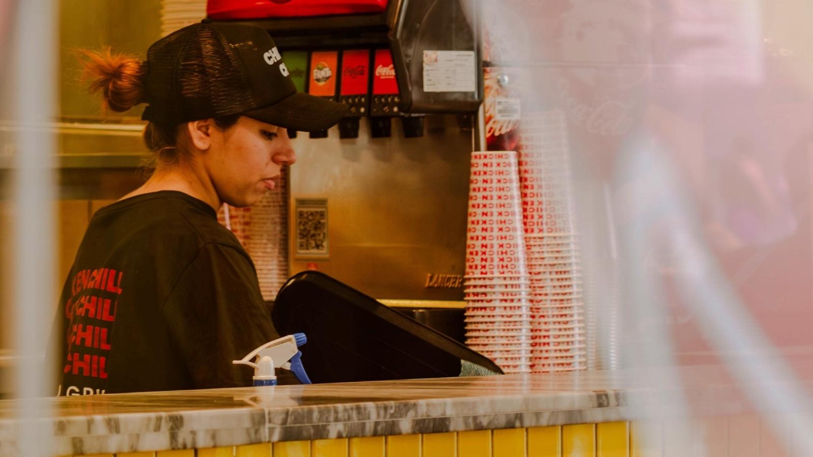 The Policy Trap: Why a Model Employee Faced Suspension for a Coworker’s Last Minute No Show fast food worker by soda machine