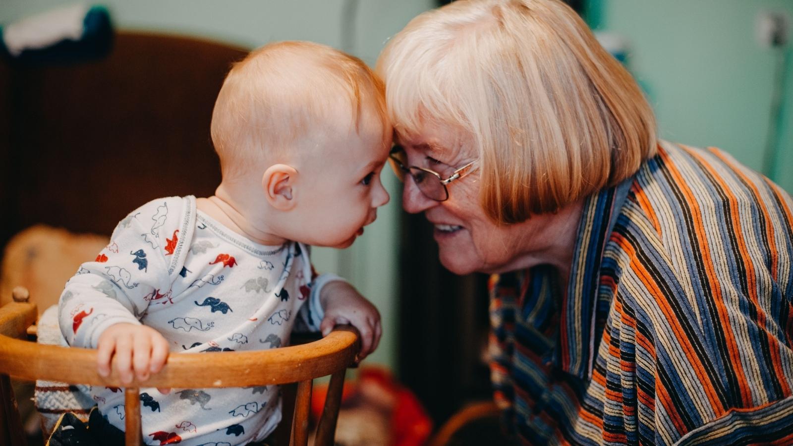 Grandmother Wants to Be Paid for Watching Her Grandkids Four Days a Week, but Her Daughter Says She Should “Step Up” grandmother talking to a grandchild