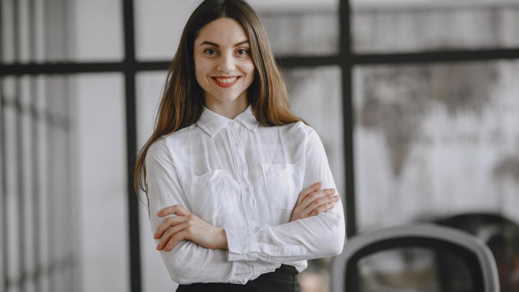 happy professional woman crossing her arms