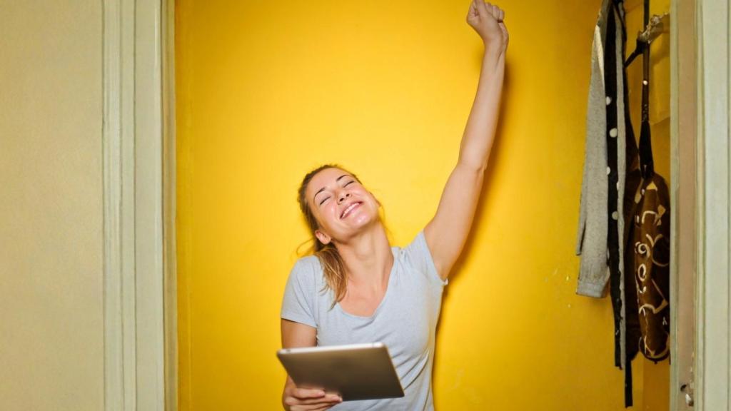 happy woman celebrating a victory