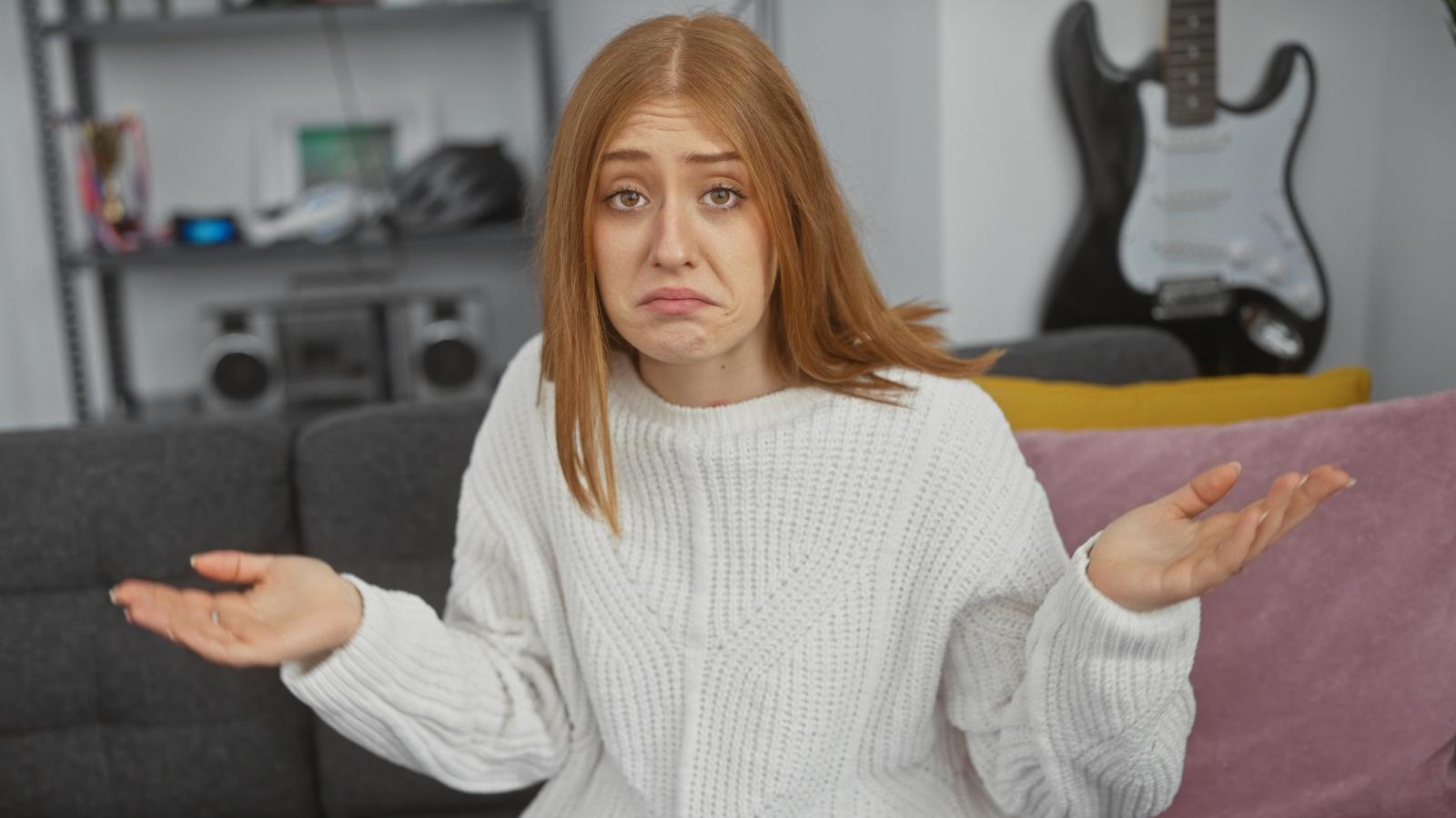 woman shrugging her shoulders