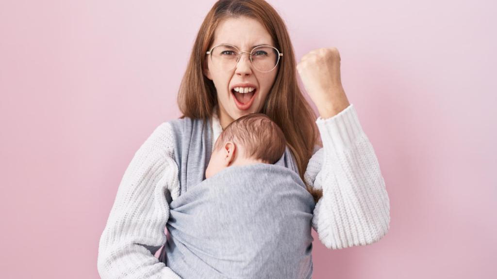 woman holding a baby
