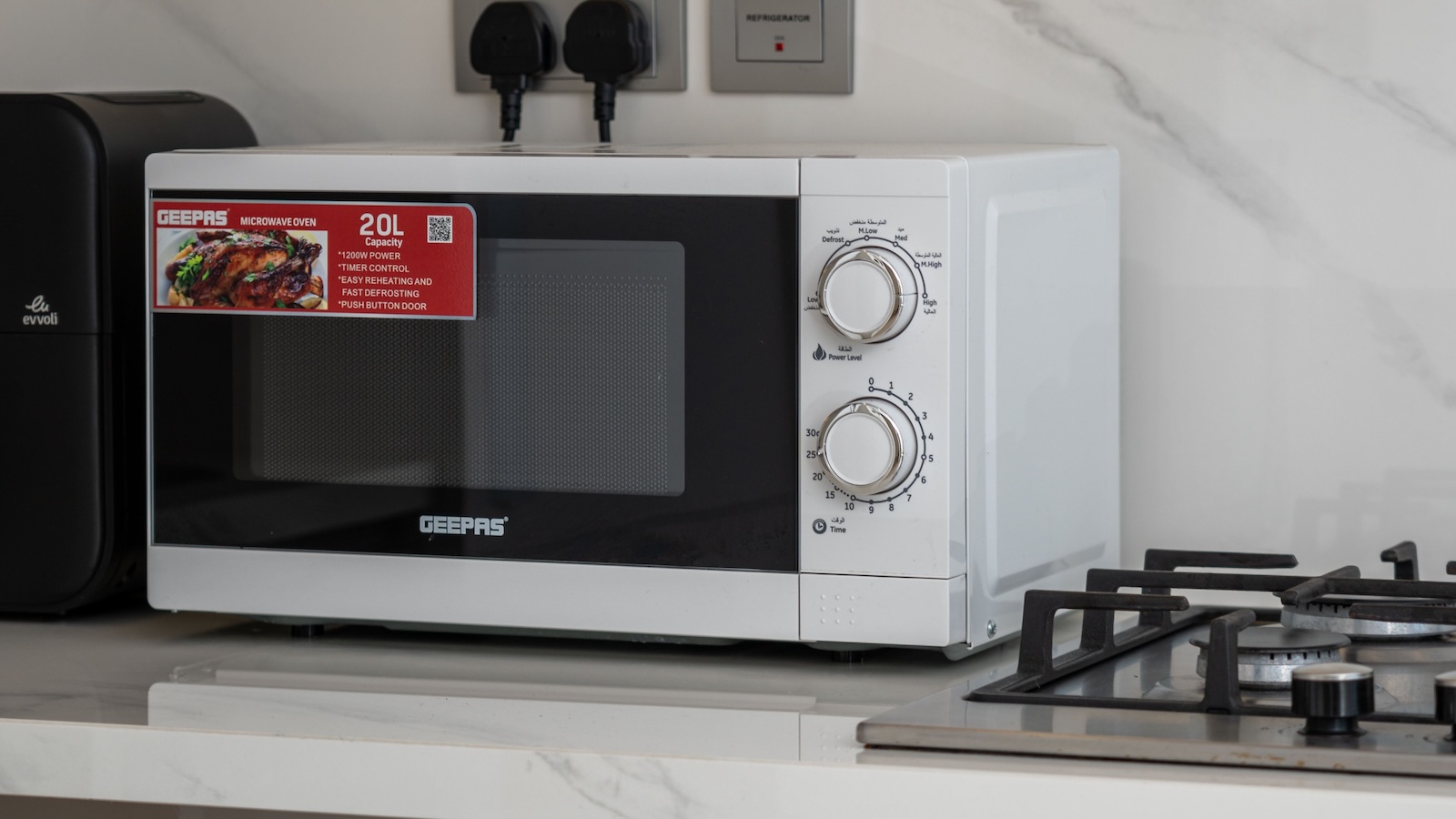 The Customer Is Always... Wrong? Hotel Guest Refuses to Believe Clerk, Only to Learn a Humiliating Lesson white microwave sitting in a break room or hotel