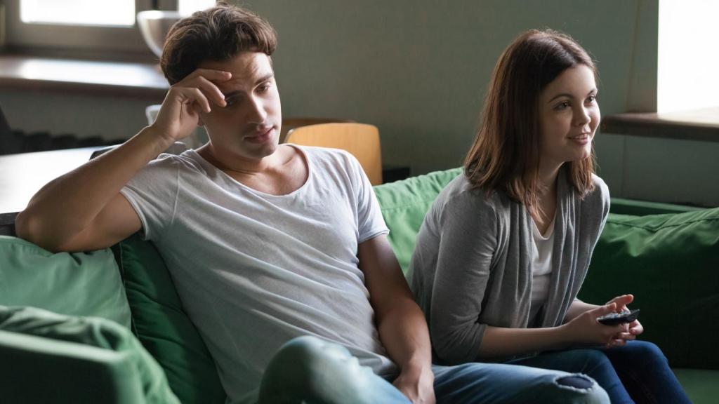 man and woman on a couch