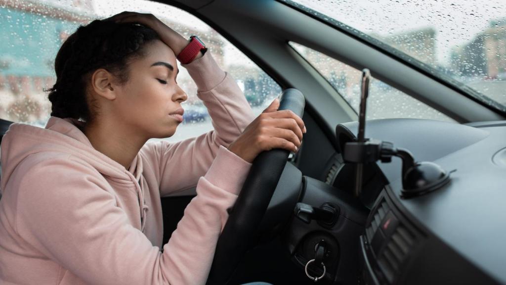 woman sitting in a car