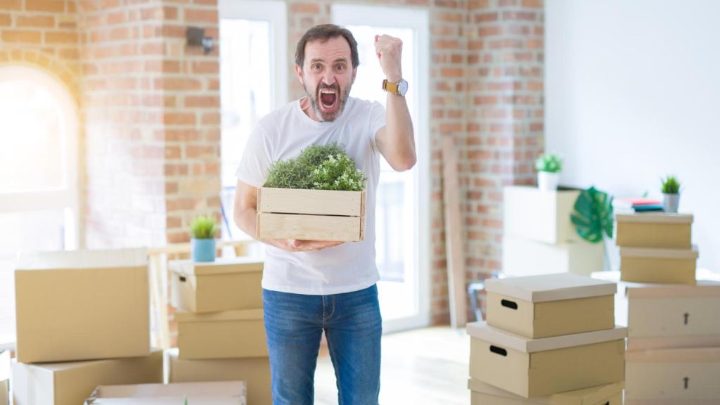 man moving out of an apartment