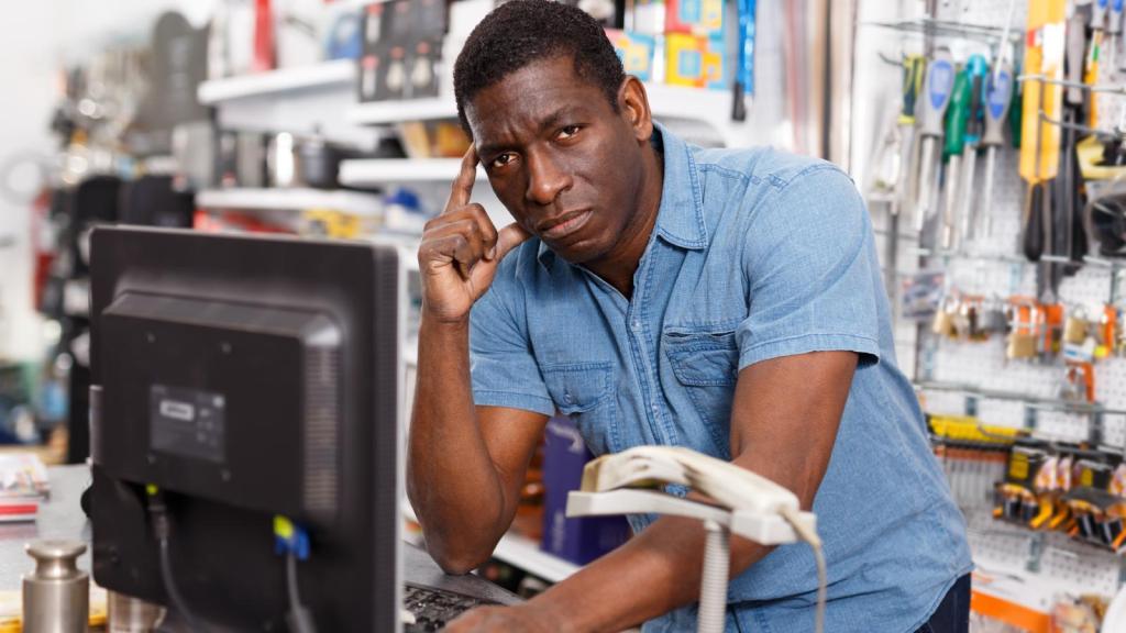 man working at a store