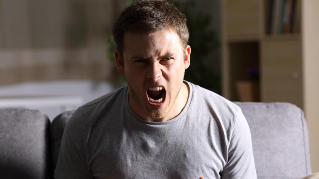 man screaming in rage