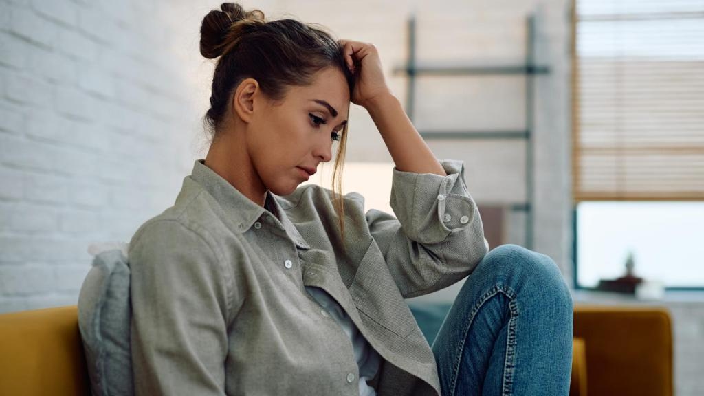 woman depressed on a couch