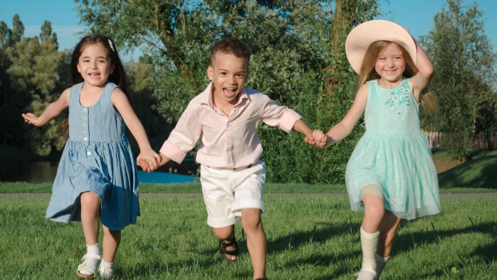kids running in a yard