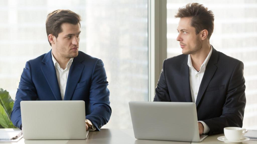 two men in an office