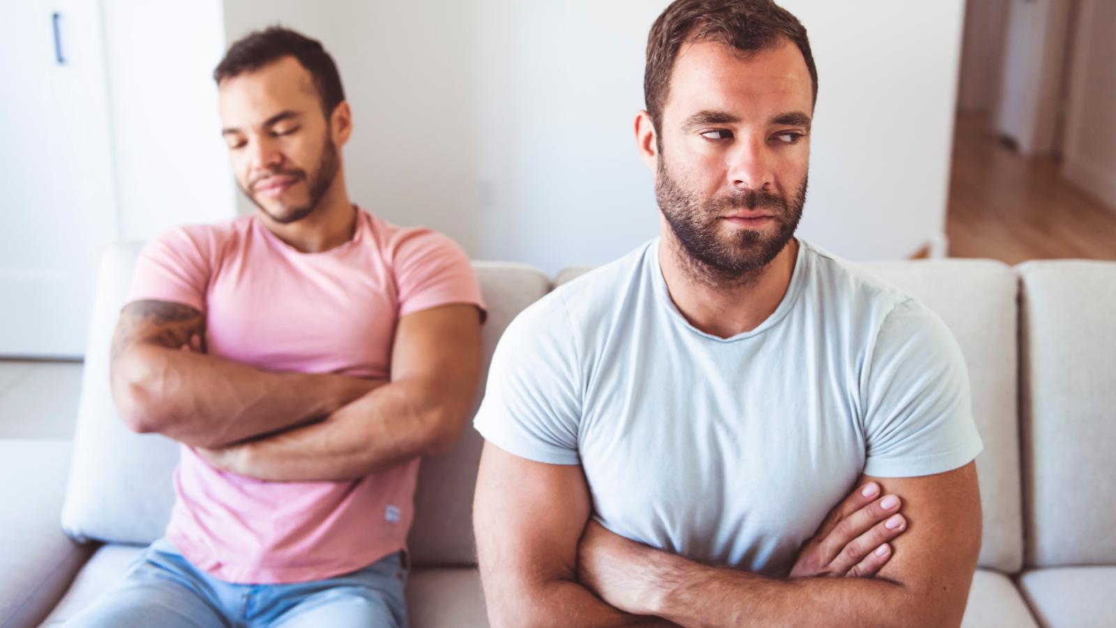 He Was Forced onto an Expensive Bachelor Trip—Then He Refused to Pay for the Ticket two men on a couch