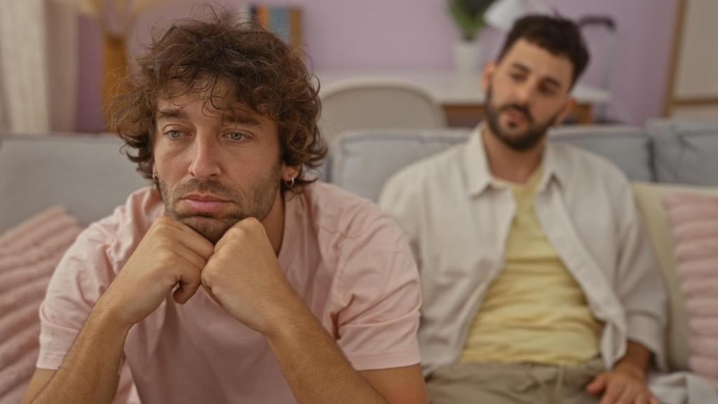 two men on a couch