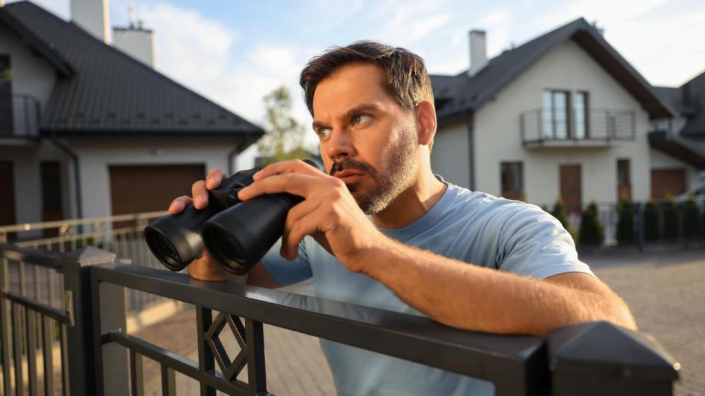 man with a pair of binoculars