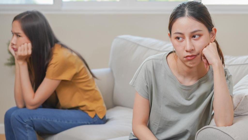 two women on a couch