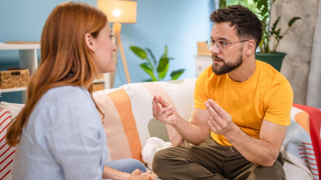man and woman having a talk
