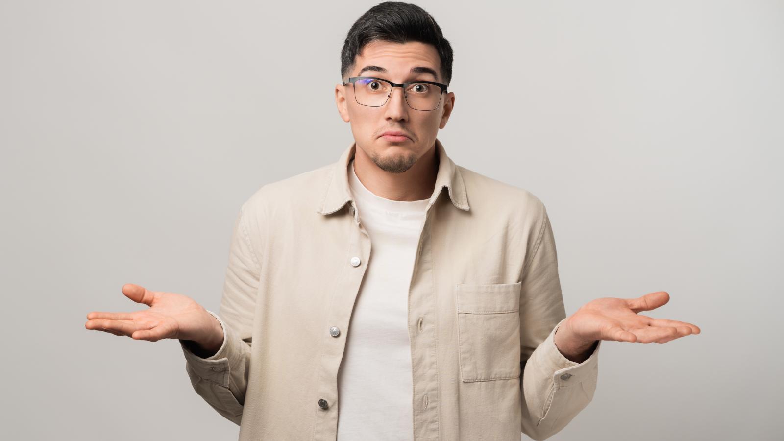 man shrugging his shoulders