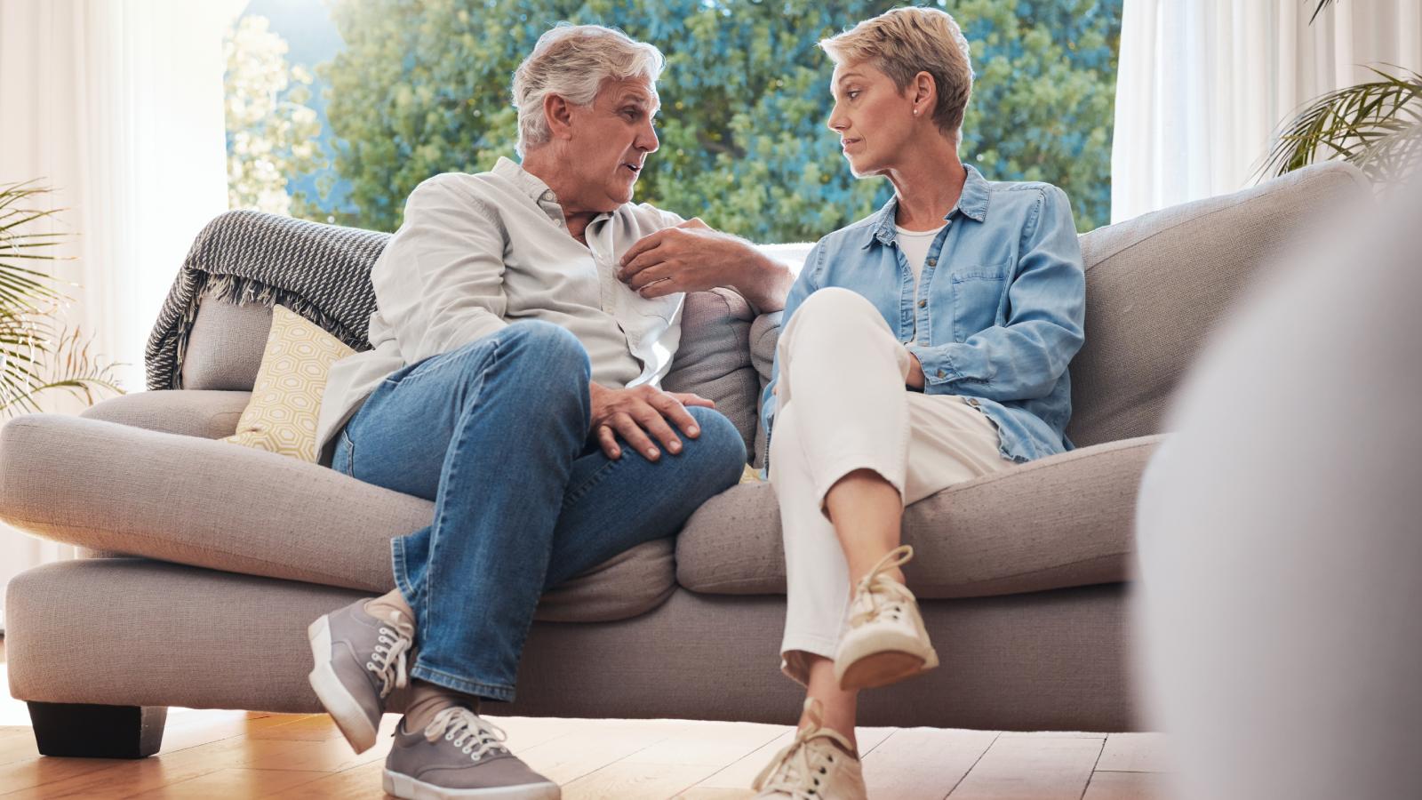 His Girlfriend Asked Him To Contribute More To Their Expenses—He Doesnt Think Its Fair older couple on a couch