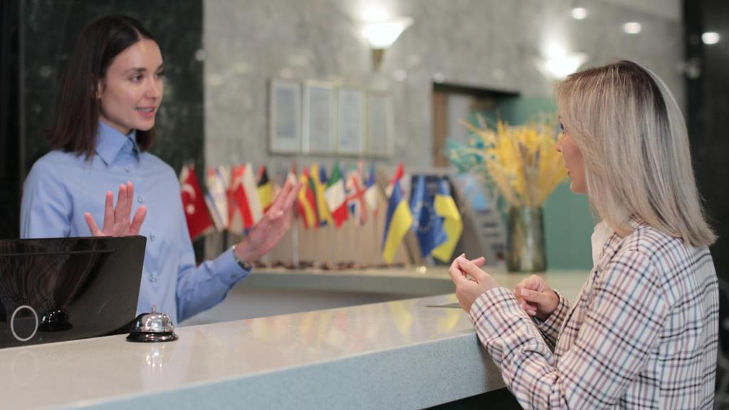 woman at a hotel front desk