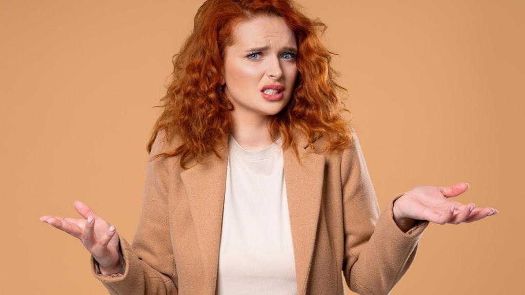 woman shrugging her shoulders
