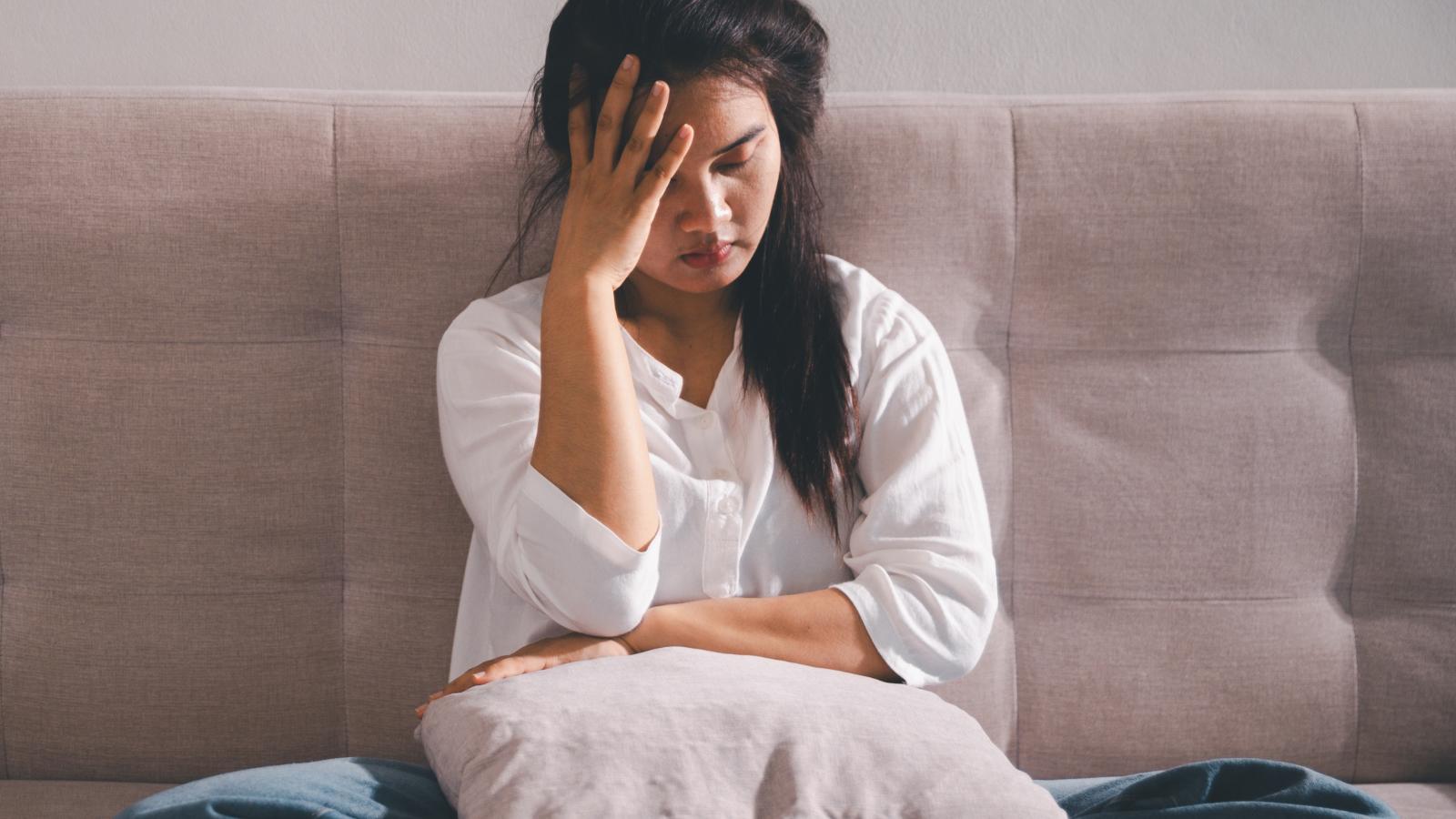 She Told Her Family About Her Upcoming Wedding — Their Response Was to Be Offended They Werent Told Sooner woman on a couch