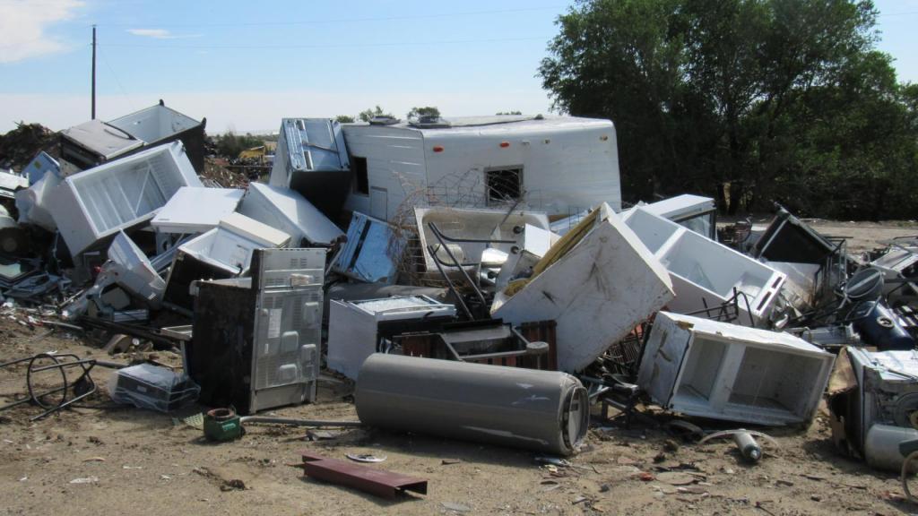 junk piled in a yard
