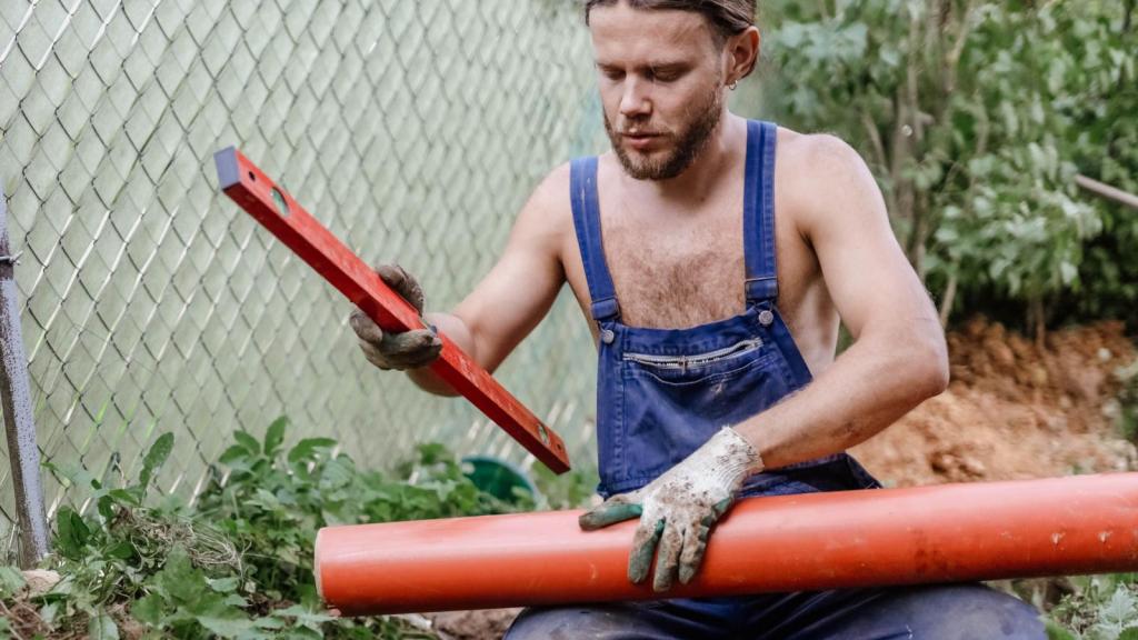 man holding a pipe