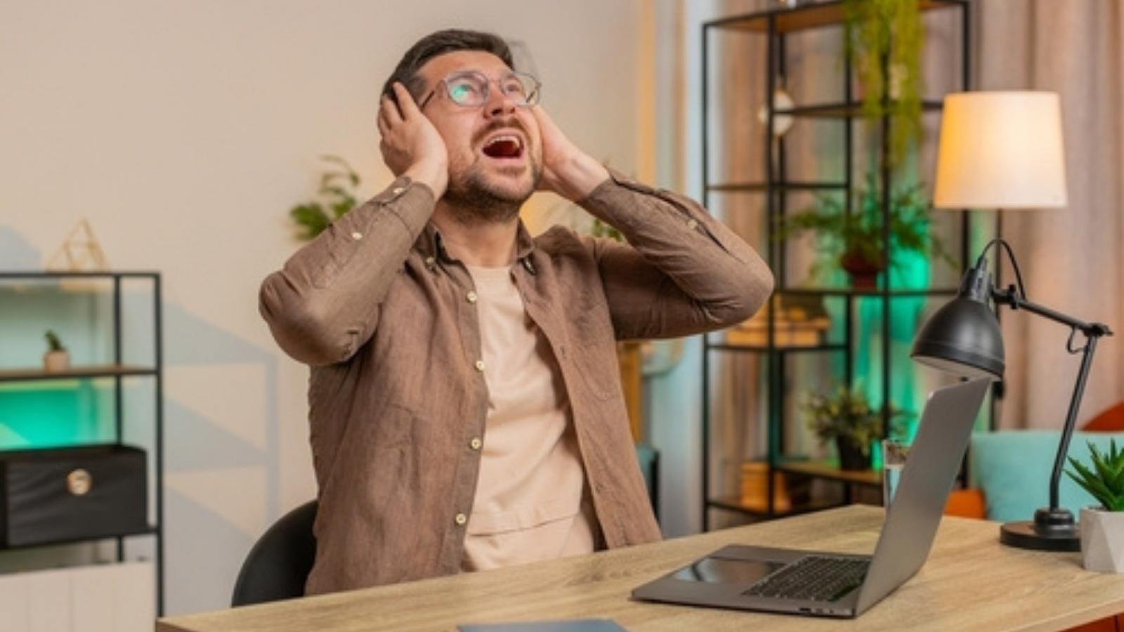 Man annoyed by loud neighbors