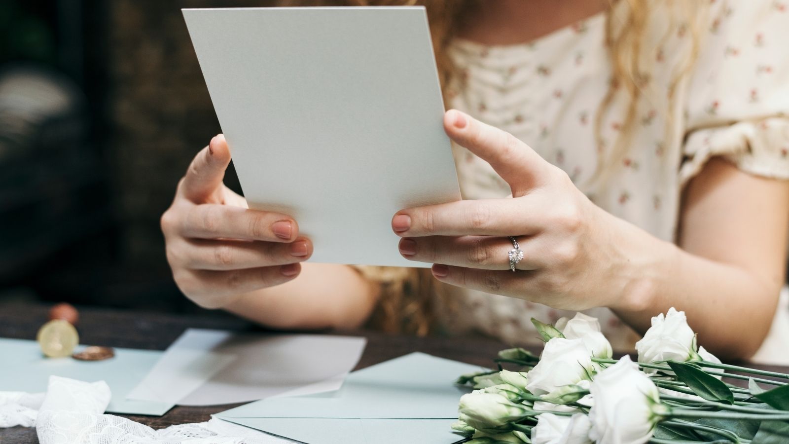 Wedding Invitation Leaves Guest Confused Until She Learns She’s Only Invited to the Reception bride stuffing wedding invitations