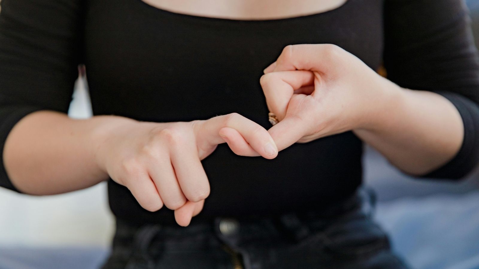 woman using sign language